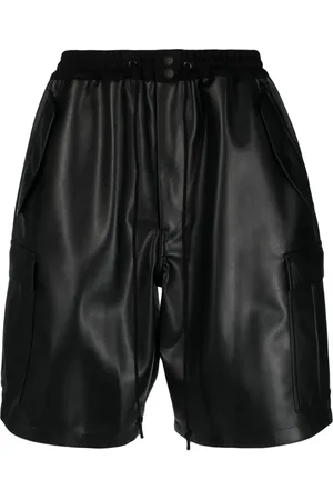 JUNYA WATANABE Cargo-pockets faux-leather shorts