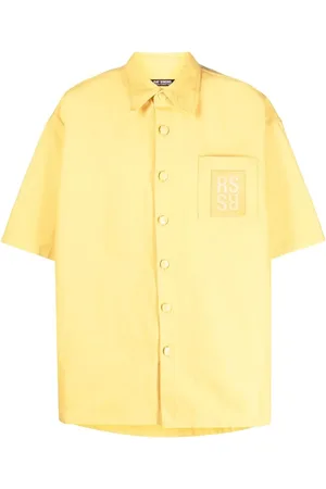 RAF SIMONS Logo-patch denim short-sleeved shirt