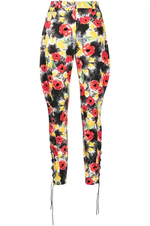 CHANEL 1997 camellia-print slim-cut trousers