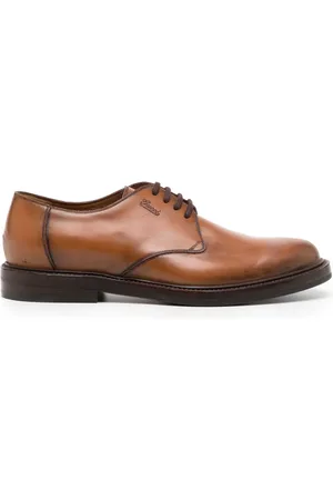 Gucci Logo-debossed leather Derby shoes