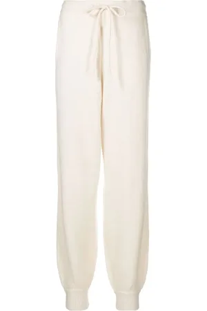 REMAIN Tapered-leg knitted trousers
