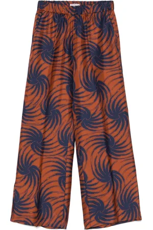 ALBERTO BIANI Abstract-print trousers
