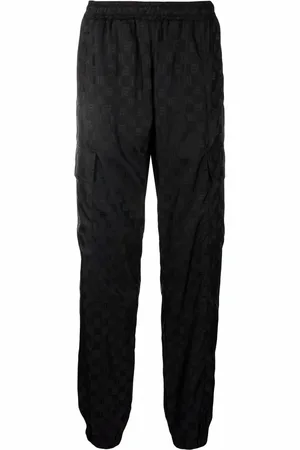 MISBHV Monogram-print trousers