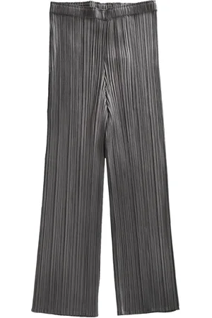 PLEATS PLEASE ISSEY MIYAKE Pleated flared trousers