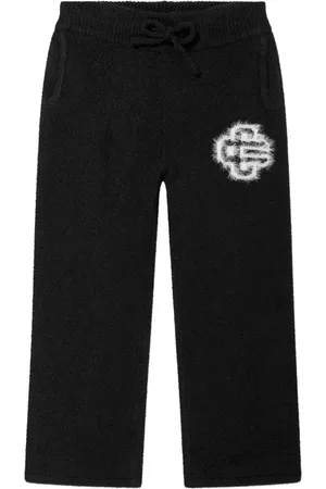 The Couture Club Jacquard-emblem trousers