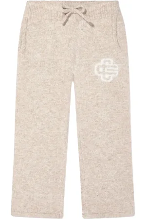 The Couture Club Jacquard-emblem trousers