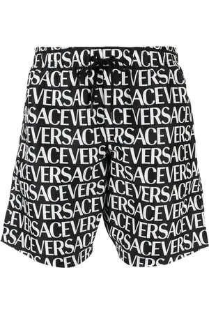 VERSACE Logo-print swim shorts