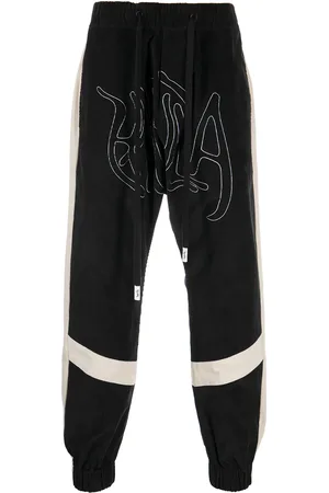 HACULLA Embroidered-logo drop-crotch trousers
