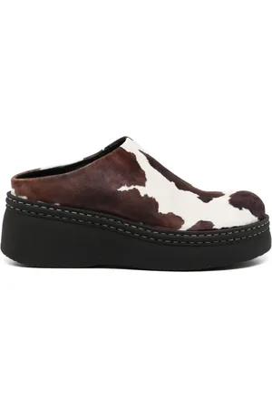 Miista Kristi cow print mules