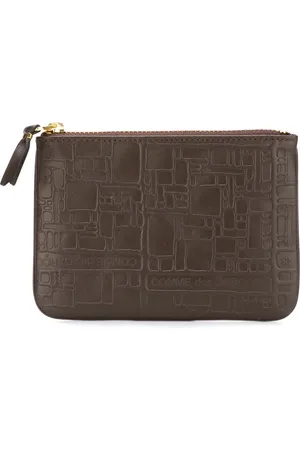 Comme des Garçons Embossed Logo