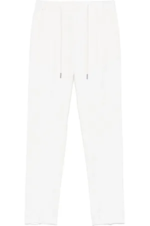 TAGLIATORE Pleat-detailed trousers