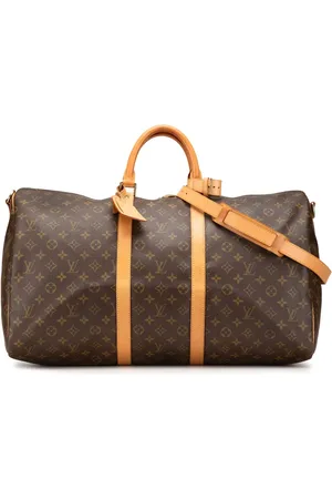 LOUIS VUITTON 1997 Monogram Keepall Bandouliere 55 travel bag
