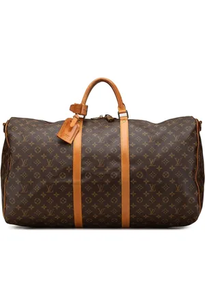LOUIS VUITTON 1987 Monogram Keepall Bandouliere 60 travel bag