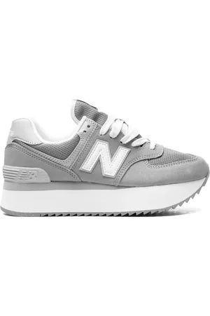 New Balance 574+ low-top suede sneakers