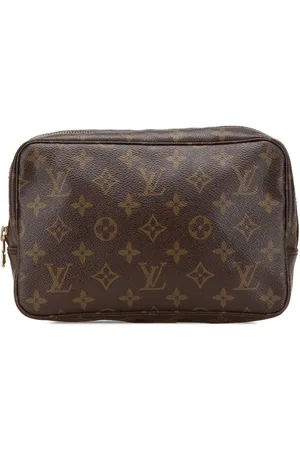 LOUIS VUITTON 1996 Monogram Trousse Toilette 23 clutch bag