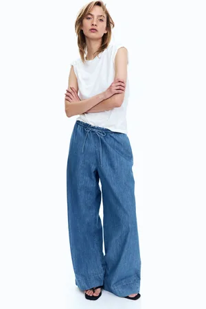 H&M Dżinsowe spodnie bez zapięcia
