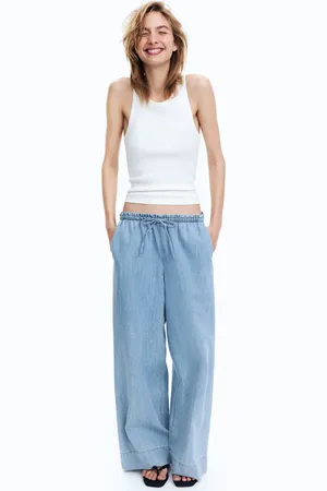 H&M Dżinsowe spodnie bez zapięcia