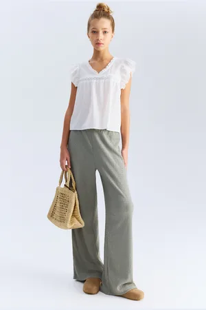H&M Dżersejowe spodnie w strukturalny splot