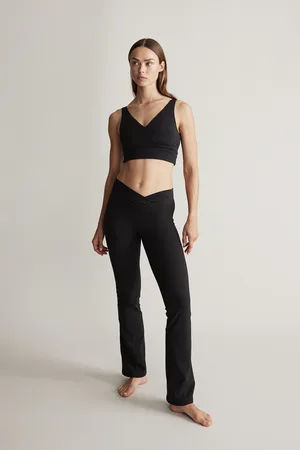 H&M Rozszerzane legginsy sportowe SoftMove