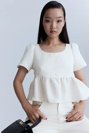 H&M Brokatowa bluzka z baskinką