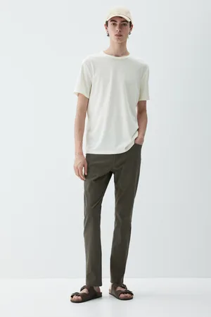 H&M Spodnie z bawełnianego diagonalu Slim Fit