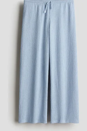 H&M Dżersejowe spodnie w strukturalny splot