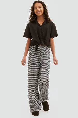 H&M Dżersejowe spodnie w strukturalny splot