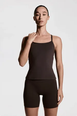 H&M Sportowy top SoftMove z wbudowanym biustonoszem