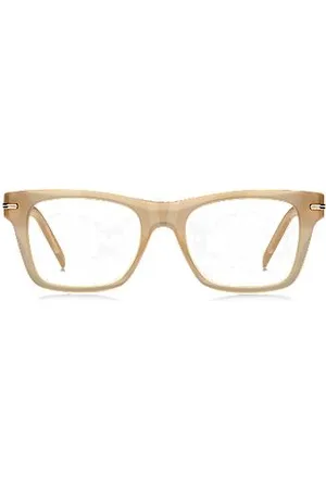 HUGO BOSS Oprawki okularów z beżowego acetatu z charakterystycznym detalem w złotym odcieniu