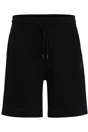 HUGO BOSS Szorty o luźnym kroju z bawełny frotte z naszywką z logo