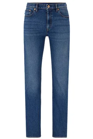 HUGO BOSS Jeansy o wąskim kroju z denimu ze stretchem w średnim odcieniu niebieskiego