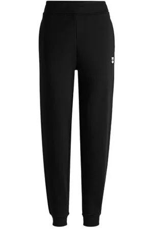 HUGO BOSS Spodnie dresowe z bawełny frotte z dwupoziomowym logo