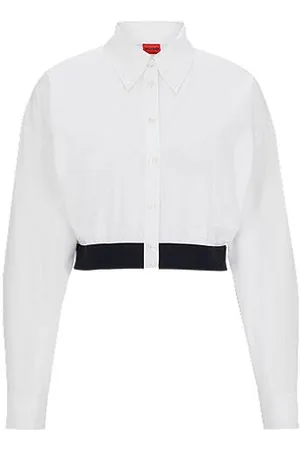 HUGO BOSS Bluzka o swobodnym kroju z kontrastowym paskiem w talii z logo