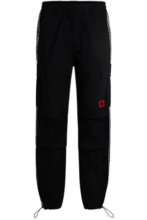 HUGO BOSS X RB — bojówki o regularnym kroju z taśmą z logo