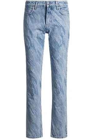 HUGO BOSS Jeansy o wąskim kroju z niebieskiego denimu z laserowym wzorem