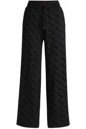 HUGO BOSS Spodnie dresowe ze sznurkiem w pasie i flokowanym nadrukiem logo