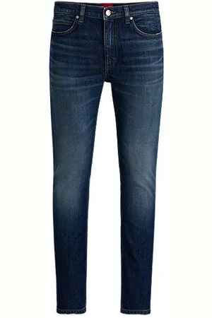 HUGO BOSS Jeansy o bardzo wąskim kroju z denimu ze stretchem w ciemnoniebieskim odcieniu