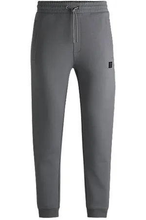 HUGO BOSS Spodnie dresowe z mieszanki bawełny z pionowym logo