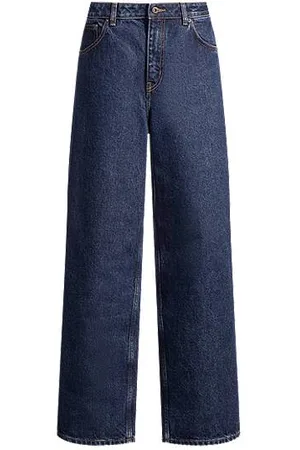 HUGO BOSS Dżinsy o luźnym kroju ze spranego niebieskiego denimu