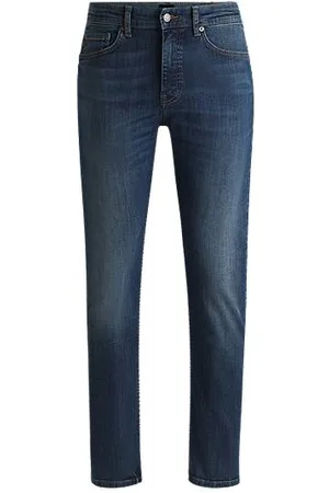 HUGO BOSS Jeansy Delaware o wąskim kroju z denimu ze stretchem w ciemnoniebieskim odcieniu