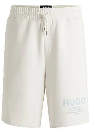 HUGO BOSS Szorty o luźnym kroju z bawełny frotte z nadrukiem logo