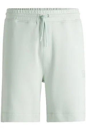 HUGO BOSS Szorty o luźnym kroju z bawełny frotte z naszywką z logo