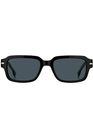 HUGO BOSS Okulary przeciwsłoneczne z czarnego octanu za dodatkami w złotym kolorze