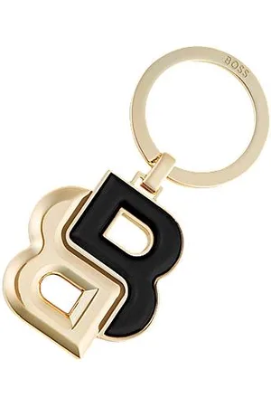 HUGO BOSS Breloczek z czarnym i złotym monogramem Double B