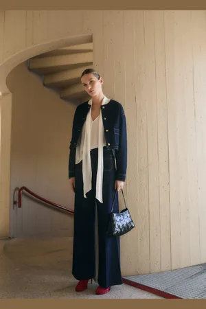MANGO Dżinsy wideleg z kieszeniami rinse wash