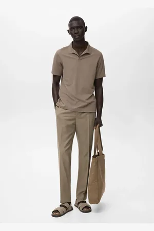 MANGO Spodnie bawełniane o fasonie tapered cropped
