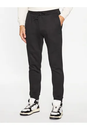PUMA Spodnie dresowe tech 538286 Regular Fit