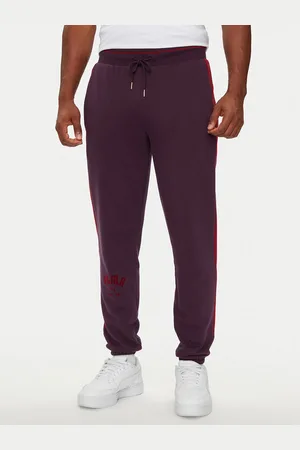 PUMA Spodnie dresowe T7 PLAY.PARIS 626768 44 Regular Fit
