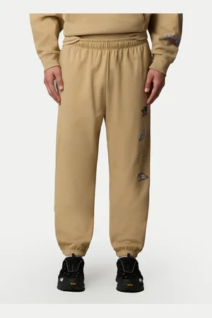 The North Face Spodnie dresowe Unisex Mountain Cleanup NF0A8C2W Relaxed Fit