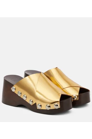 Ganni Embellished metallic leather clogs